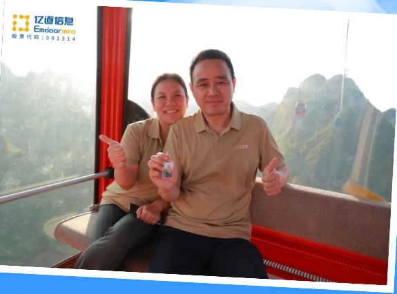 Team members crossing the suspension bridge at Ruyi Peak